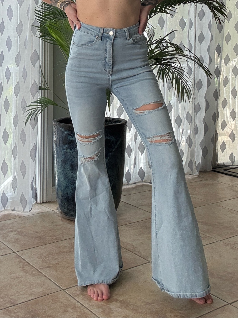 High-Waist Light Blue Distressed Flared Jeans